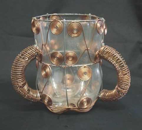 Beverage container decorated with copper wire